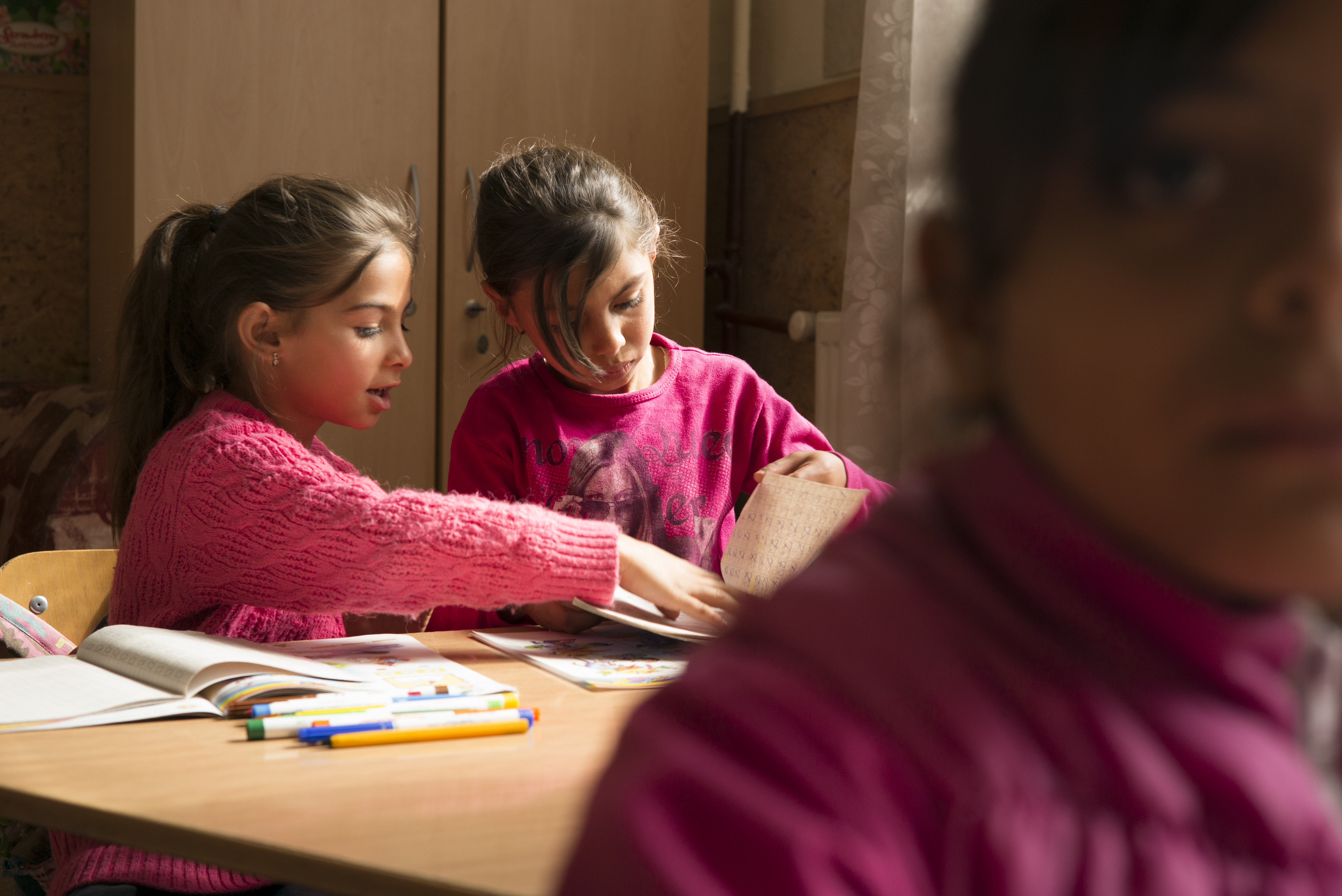 Two Roma children at school