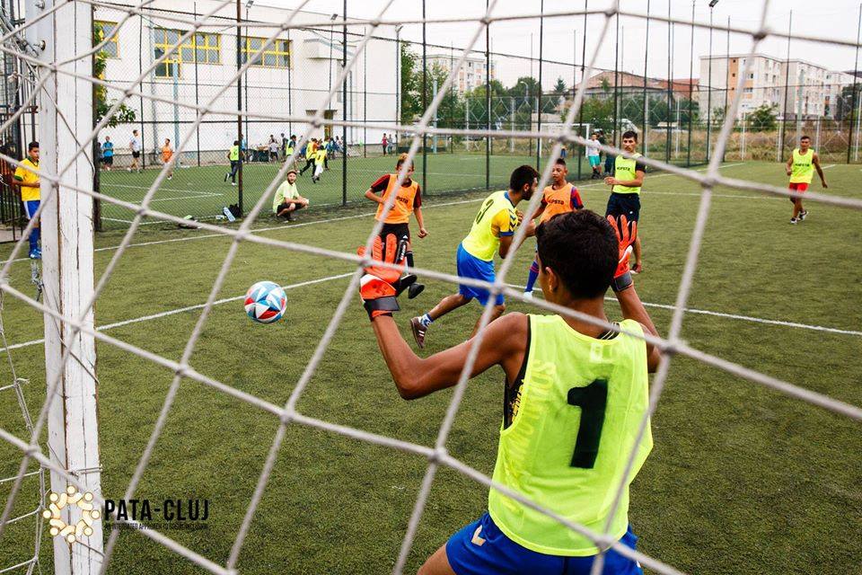 Young boys playing football