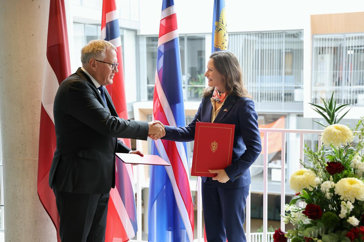 Minister of Finance of the Republic of Latvia, Mr Arvils Ašeradens and Ms Maria Varteressian, State Secretary of the Norwegian Ministry of Foreign Affairs 