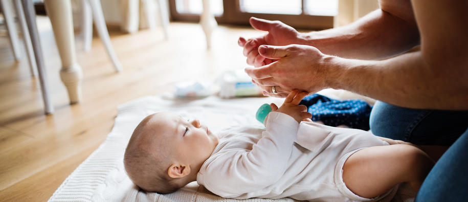 A father playing with his young child