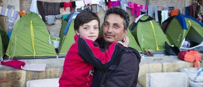 Father and son seeking asylum in Greece  
